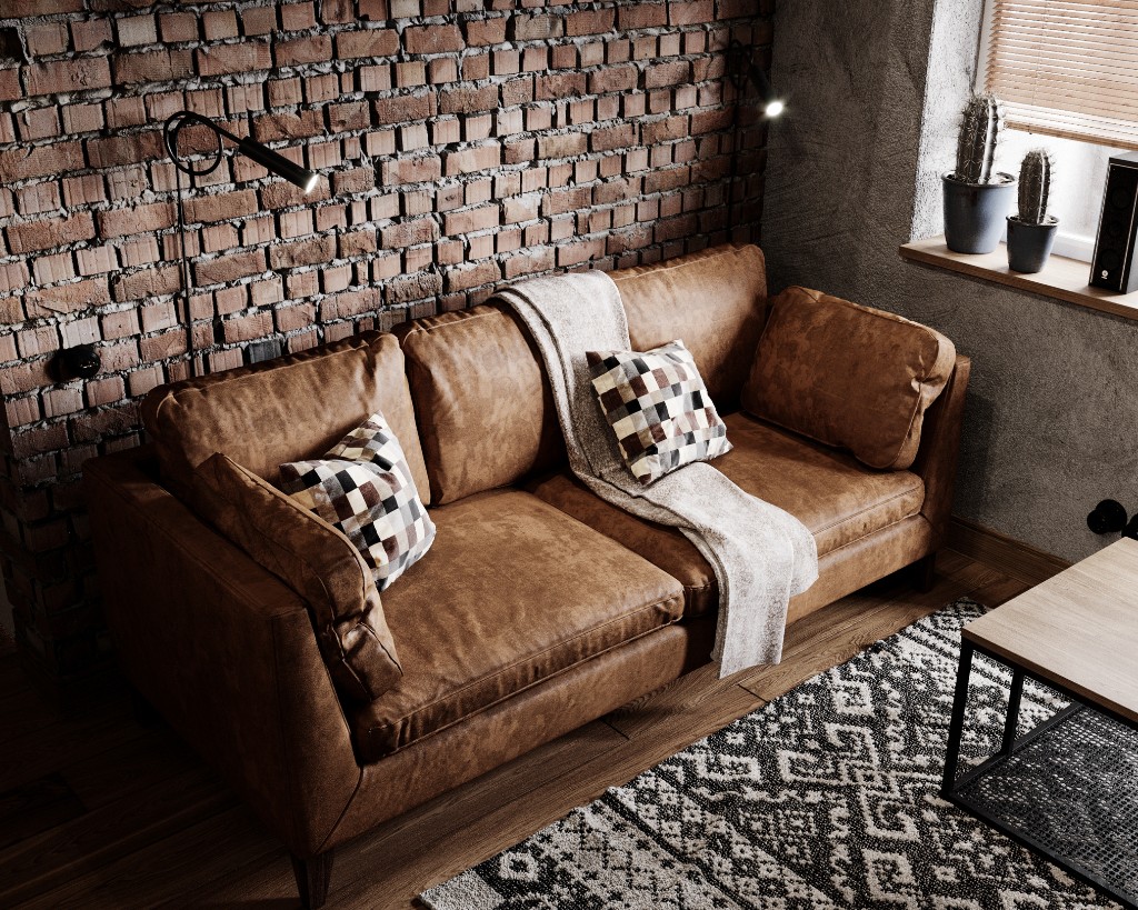 Brick Soft — leather sofa against exposed brick