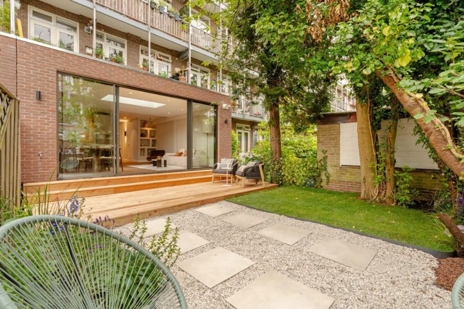 Garden Soft — brick extension opening onto a soft garden deck