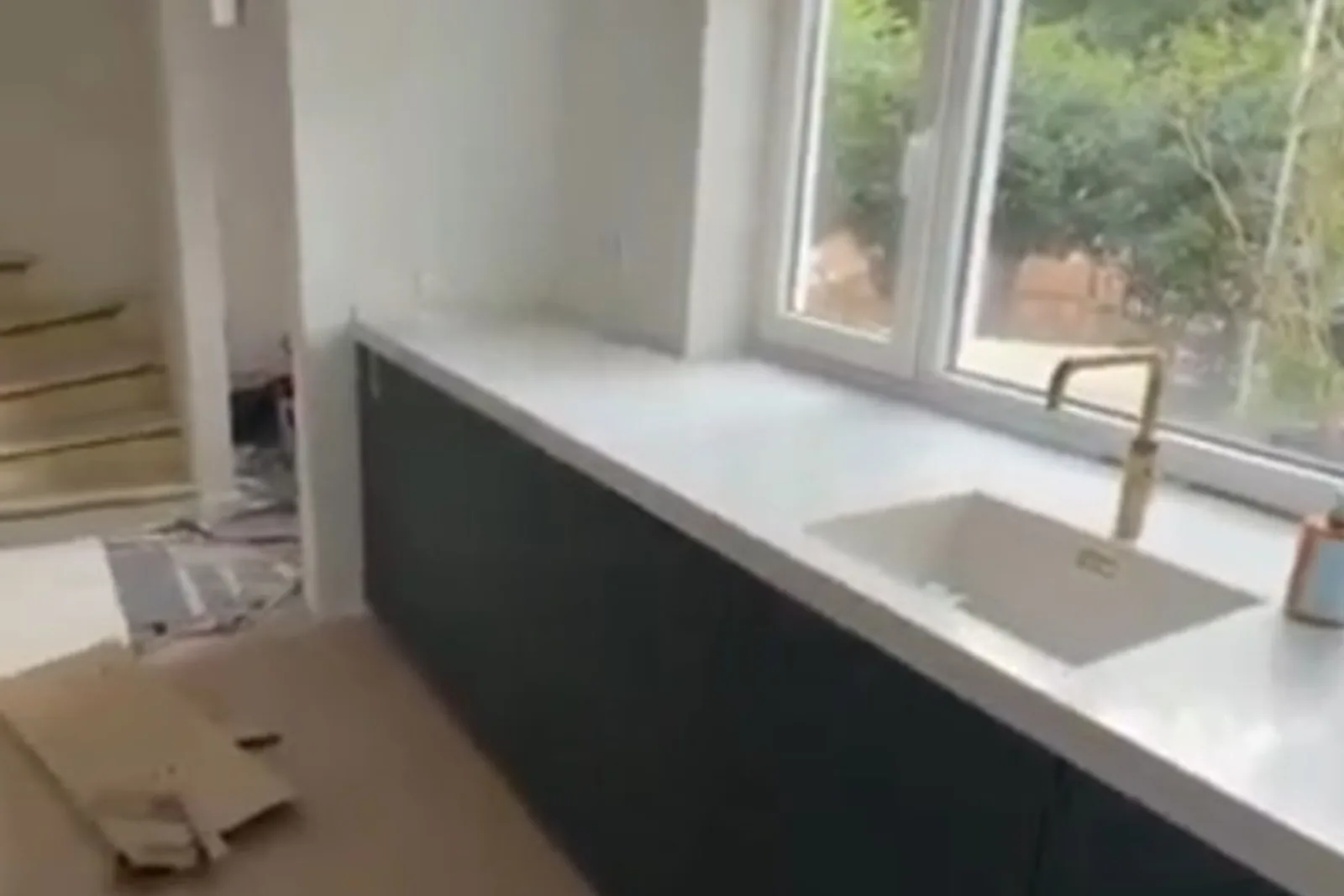 Ink Soft — dark cabinetry run under garden window