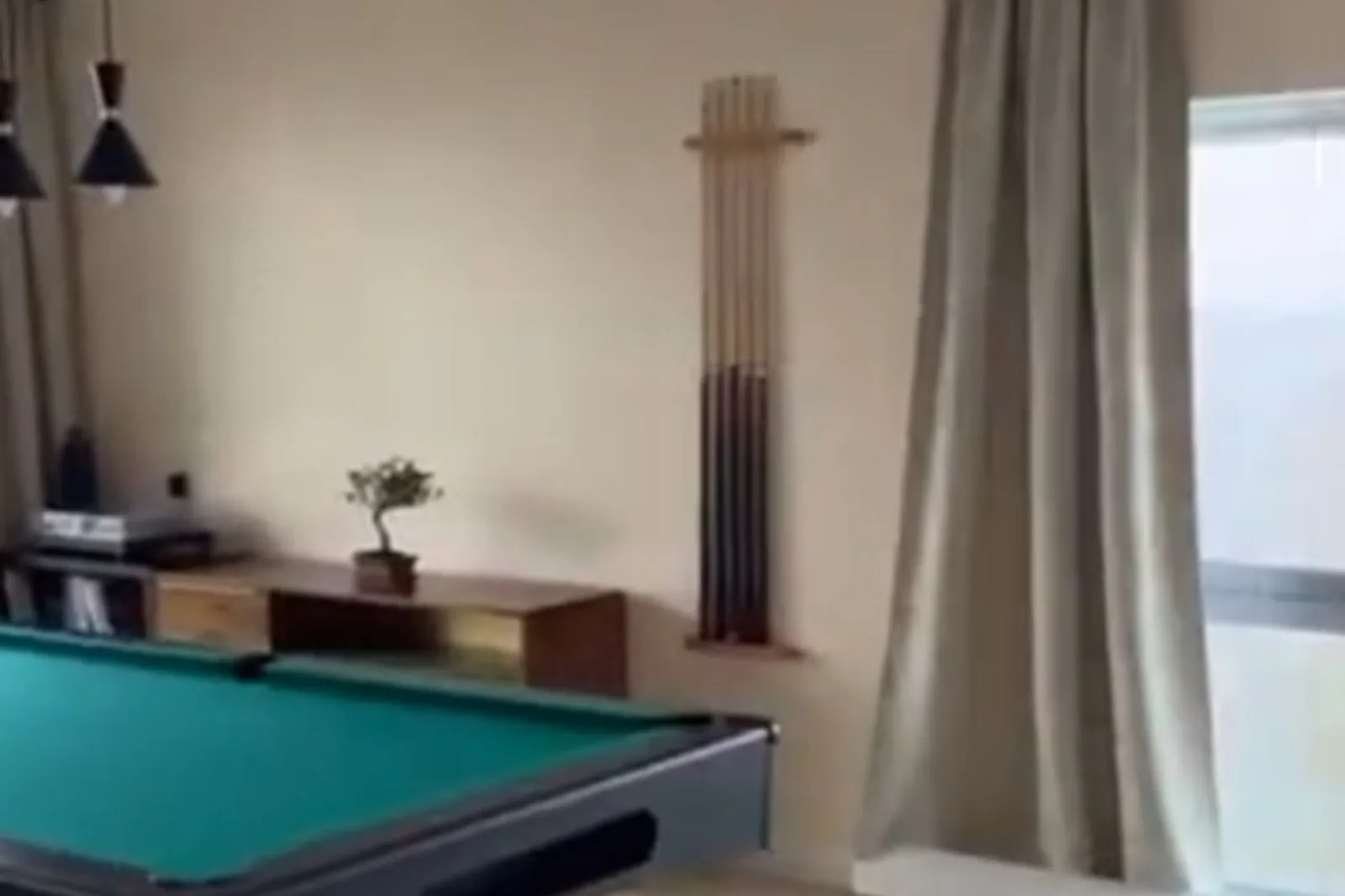 Play Soft — billiard room with cue rack and soft neutrals